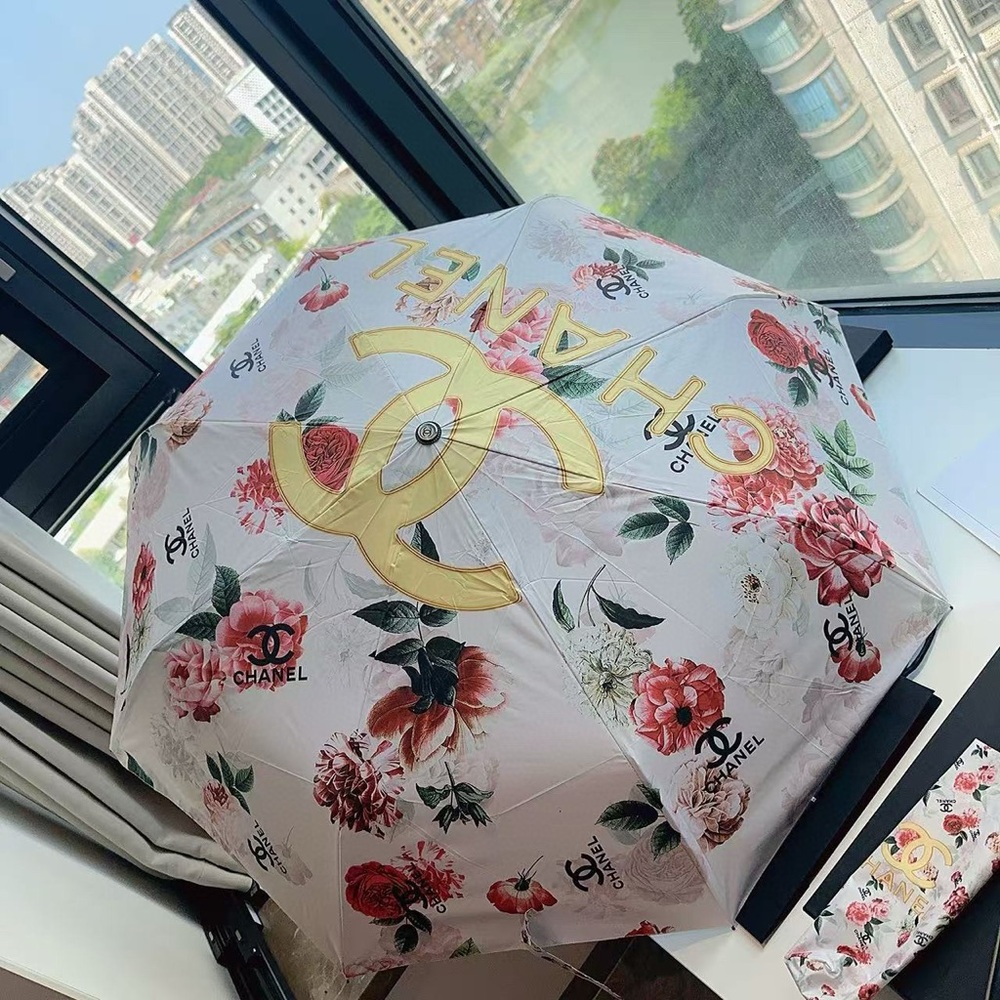 CHANEL Floral Umbrella with Gold and Red Details